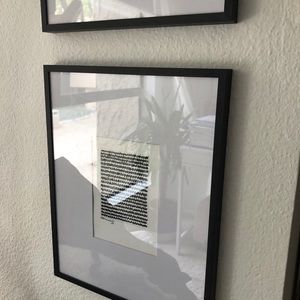 Set of 2 framed art prints.